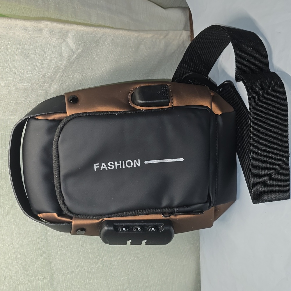 Black and Brown Men's Bag with anti-heft Insurance.